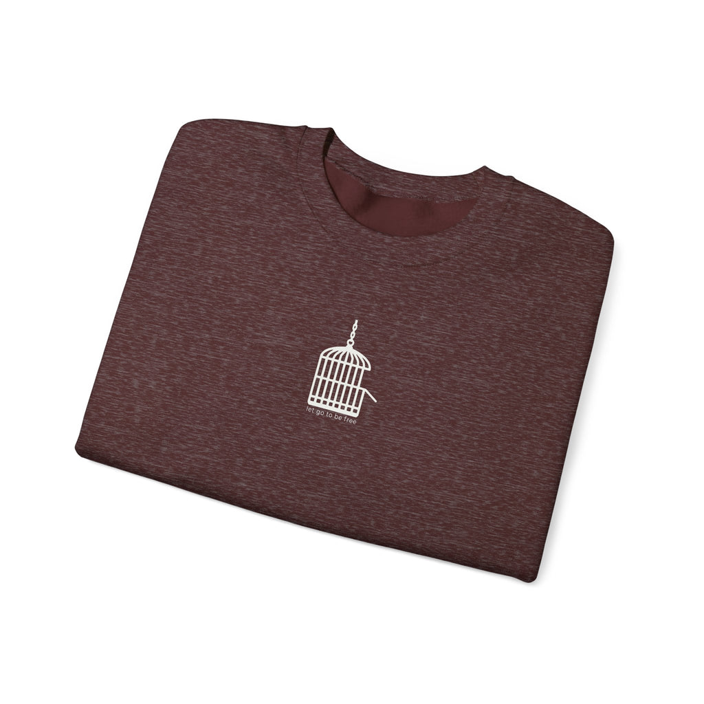 Unisex “Let Go to Be Free” Minimalist Birdcage Sweatshirt – Inspirational Streetwear Crewneck