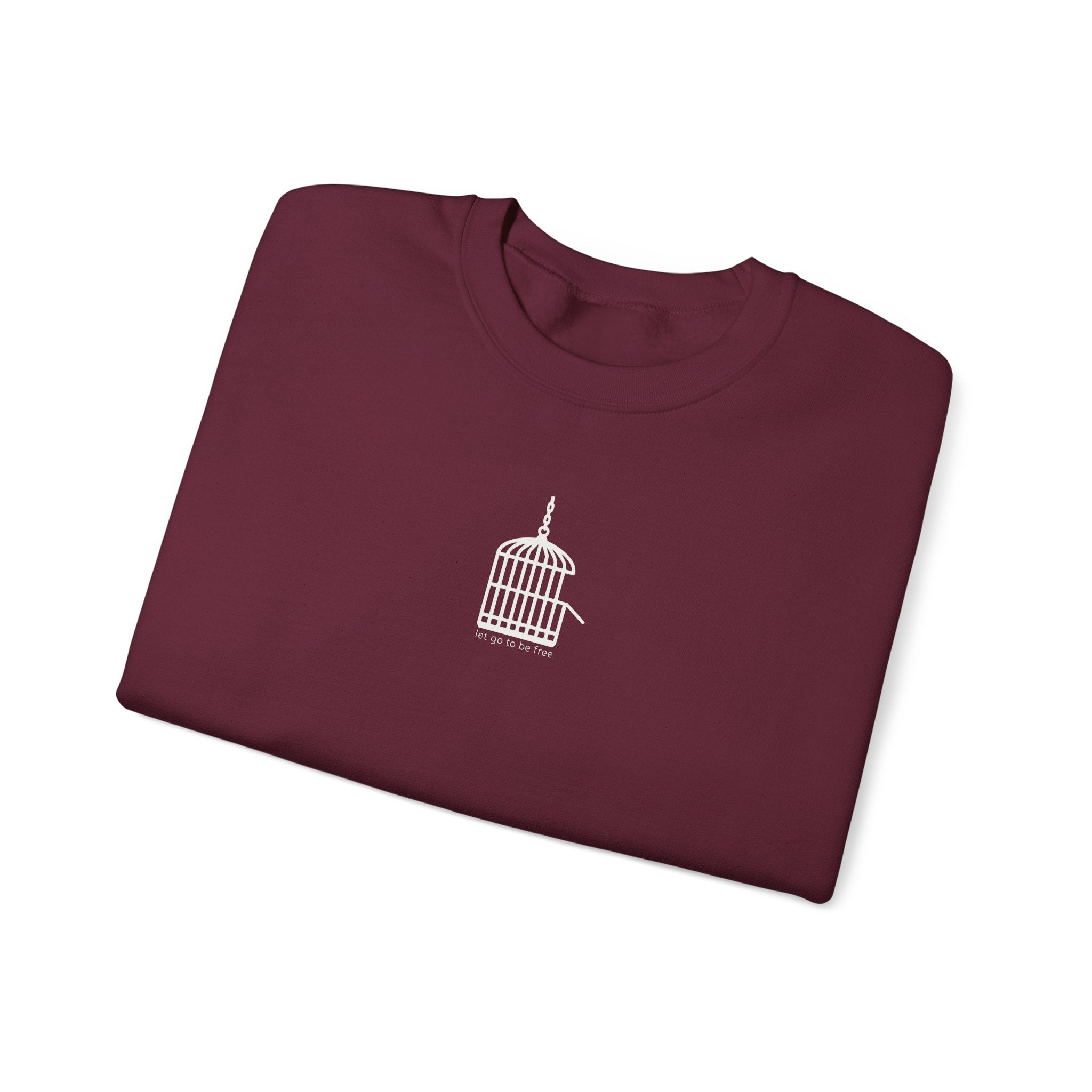 Unisex “Let Go to Be Free” Minimalist Birdcage Sweatshirt – Inspirational Streetwear Crewneck